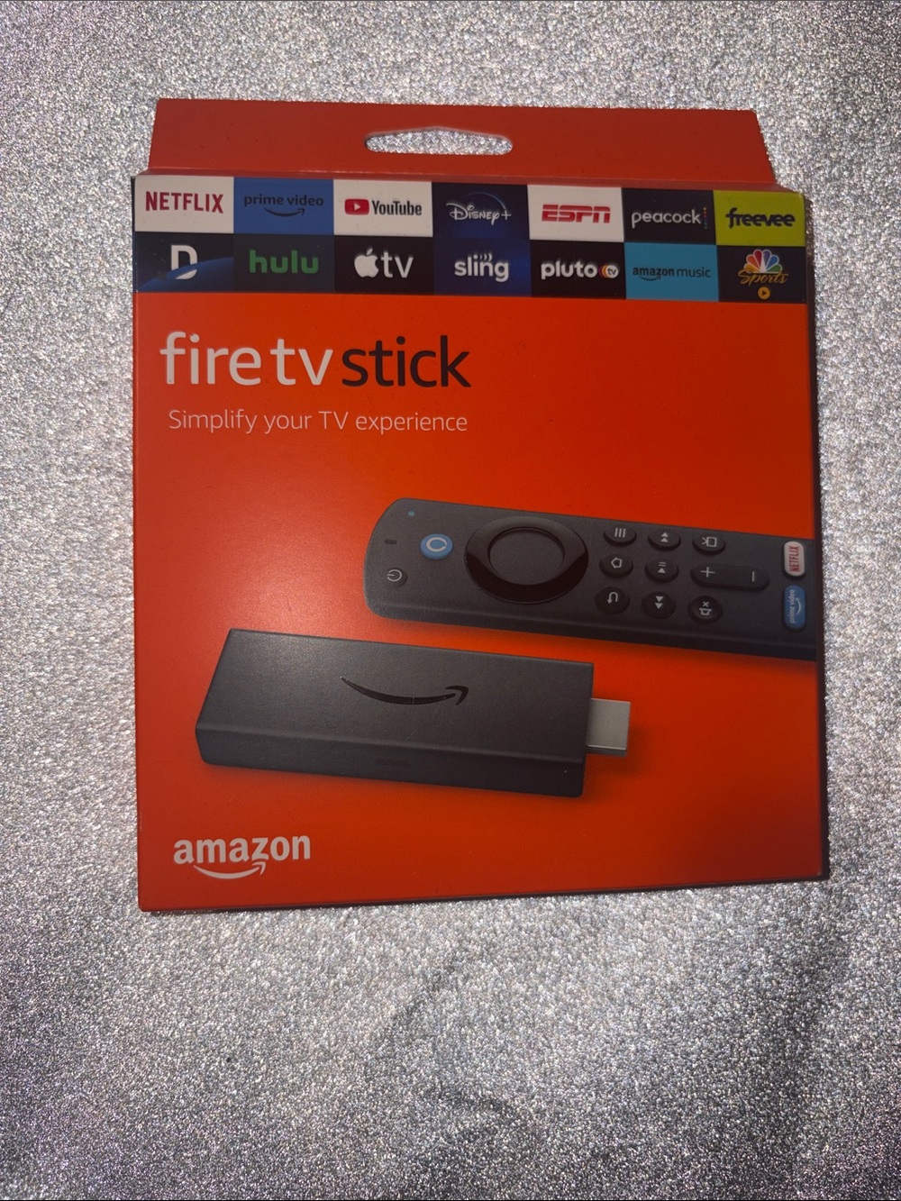 Amazon Fire TV Stick - Orange Packaging with Black Device